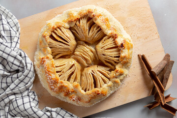 slice of apple pie on a wooden table