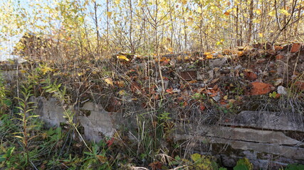 Old ancient medieval ruins of the wall in the Russian village