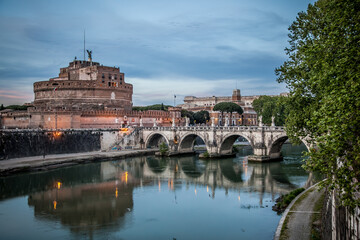 Castel Sant'angelo and the bridge of Sant'angelo across the Tiber in Rome on a may evening. Rome,...
