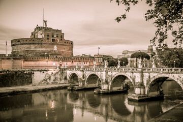Castel Sant'angelo and the bridge of Sant'angelo across the Tiber in Rome on a may evening. Rome,...
