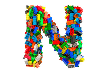 Letter N from colored plastic building blocks, 3D rendering