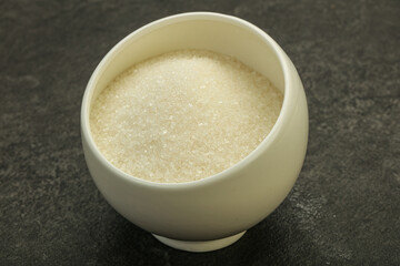 White sugar in the bowl