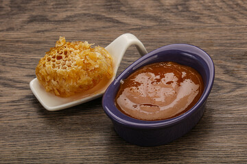 Natural honey in the bowl