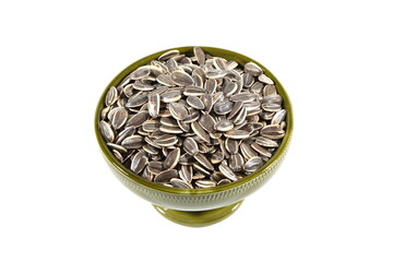 Sunflower seeds in a bowl  on a white background