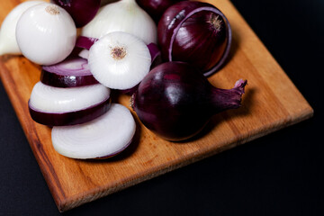 Sliced white and red onions. cutting Board.