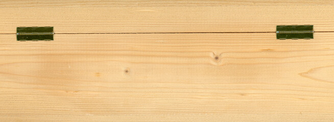 light brown wood texture background with metal hinges
