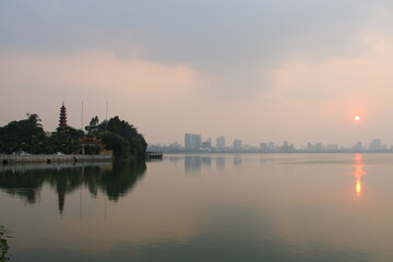 Naklejka premium Epic sunset over the skyline of Hanoi