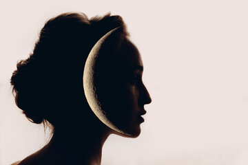 Beautiful woman profile silhouette portrait with moon in her head. Feminism concept.