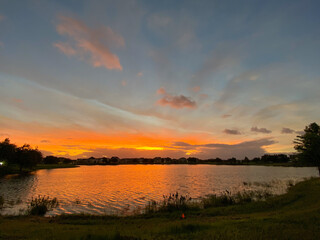 Beautiful pink, orange and blue sunset reflecting on a lake