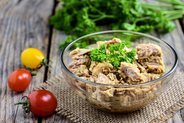 Tuna salad on the wooden background