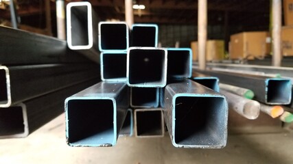Stack of various shaped and size steel tubing.