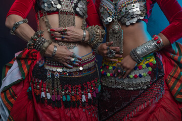Belly dancers, indian dancers and flamenco dancers close-up cropped photo
Bundled suits, ancient is...
