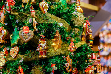 Fototapeta premium Bruges, Flanders, Belgium, Europe - October 1, 2019. Close-up of a Christmas tree decorated with Christmas toys in Brugge)