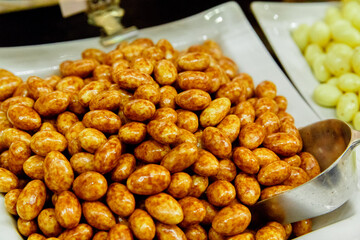 Fototapeta premium Bruges, Flanders, Belgium, Europe - October 1, 2019. Belgian chocolate in a traditional chocolate shop in Bruges (Brugge) Belgium. Chocolate candy in a store window. Stand with chocolates.