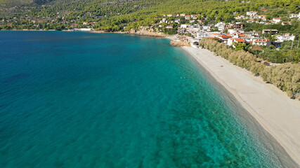 Aerial drone photo of beautiful seaside village and turquoise beach of Porto Germeno, Corinthian gulf, West Attica, Greece