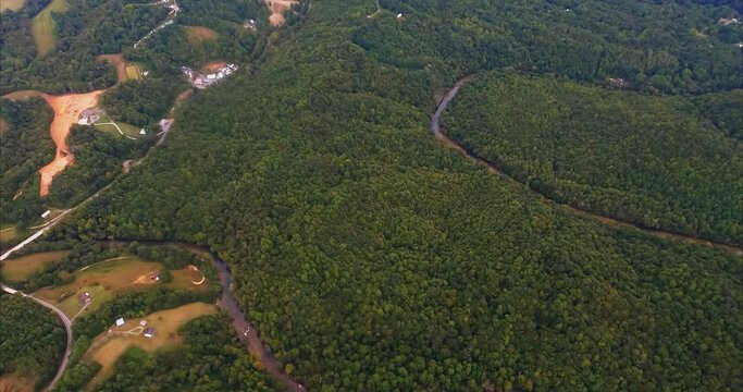 The Dan River in North Carolina is seen snaking through the forest below as I fly over. The Dan River flows 214 miles in North Carolina and Virginia. It rises in Patrick County, Virginia, and crosses 