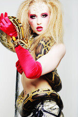 burlesque woman holding phyton