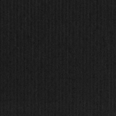 A black vintage rough sheet of carton. Recycled environmentally friendly cardboard paper texture. Simple gray minimalist papercraft background.