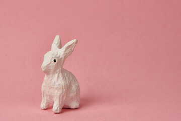 Easter bunny on a pink background toy animal holidays