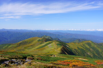 Fototapeta na wymiar Scenery of Mt. Gassan in Japan with beautiful autumn colors