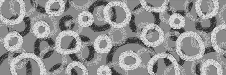 Abstract vector background, banner. Grunge circles of different sizes. Shades of gray.