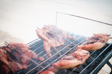 Grilled chicken was spread out for grill. Thai local food