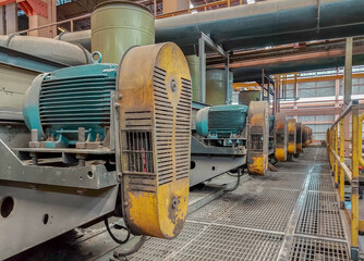 Electric motors driving water pumps.