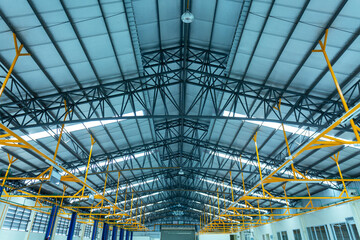 Warehouse metal roofing of car showroom Large steel roof structure bottom view with skylight...