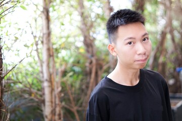 close up young man in nature garden