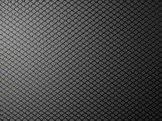 Black metal wire woven grid texture background.