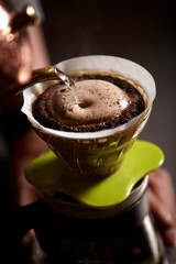 pouring coffee into a cup