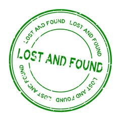 Grunge green lost and found word round rubber seal stamp on white background