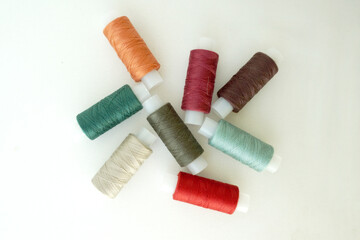 spools of thread in autumn colors