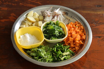 Mixed vegetables on wood background