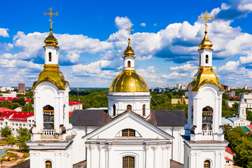Fototapeta na wymiar Vitebsk, Belarus - july 20, 2019 - Domes from the Holy Assumption Cathedral and the city