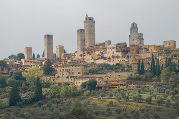 Obraz premium Medieval town of San Gimignano on a cloudy September day. Italy