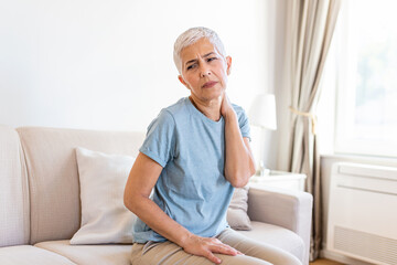 Senior woman with shoulder pain. Elderly woman is enduring awful ache. Shoulder Pain In An Elderly...