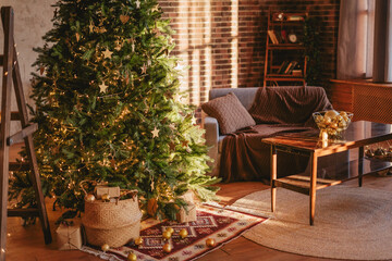 Fototapeta na wymiar Rustic interior decorated for the new year. Christmas tree in a cozy living room.