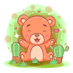 Obraz na płótnie Canvas Cute baby bear playing at the garden