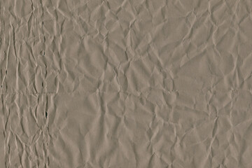 Classic vintage and old looking crumpled paper background. Retro cardboard texture. Grunge paper for drawing. Ancient book page. Present wrapping.