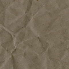 Classic vintage and old looking crumpled paper background. Retro cardboard texture. Grunge paper for drawing. Ancient book page. Present wrapping.