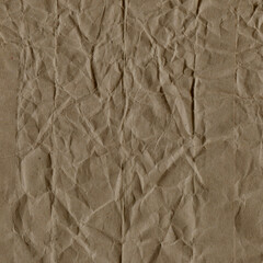 Classic vintage and old looking crumpled paper background. Retro cardboard texture. Grunge paper for drawing. Ancient book page. Present wrapping.
