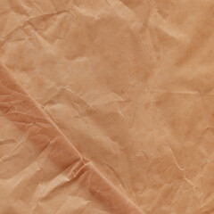 Fototapeta premium Classic vintage and old looking crumpled paper background. Retro cardboard texture. Grunge paper for drawing. Ancient book page. Present wrapping.