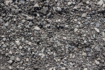 The texture of a country stone road. Background