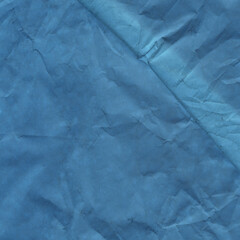 Classic vintage and old looking crumpled paper background. Retro cardboard texture. Grunge paper for drawing. Ancient book page. Present wrapping.