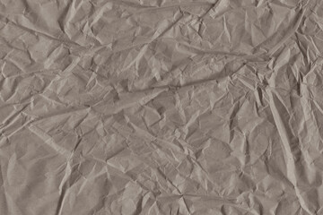 Classic vintage and old looking crumpled paper background. Retro cardboard texture. Grunge paper for drawing. Ancient book page. Present wrapping.