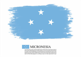 Obraz na płótnie Canvas Textured and vector flag of Micronesia drawn with brush strokes. Texture and vector flag of Micronesia drawn with brush strokes.
