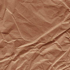 Classic vintage and old looking crumpled paper background. Retro cardboard texture. Grunge paper for drawing. Ancient book page. Present wrapping.