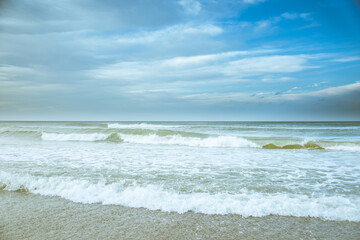 Ocean waves crashing  on the shore
