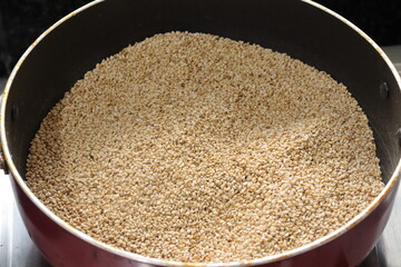 Organic natural Til Gul OR Sesame seeds over white background